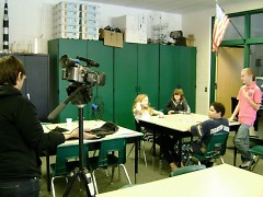 CMC’s Lynn McKeown, pictured with a group of students learning video and story collecting, which is part of the May 2 event.