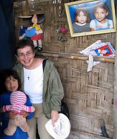 Sister Mary Navarre with one of the local Chimbote children.