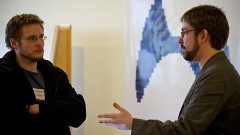 Charles Nutter (right) speaks with Drew Colthorp at SoftwareGR