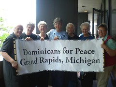 Gramd Rapids Dominicans prepare for rally and march.