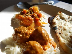 Pachraga subzi and meatball curry on rice beds with delicious fried nan 
