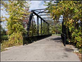The old North Park Bridge as it looks today crossing a canal in the northern end of Riverside Park.