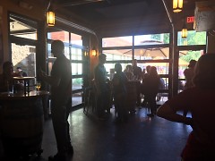 Community members gather at Meet the Editor night on June 23, 2016 at Brewery Vivant. 