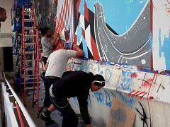 The Screwed Arts Collective at work. Shown, from left to right, Stan Chisholm, Jason Spencer and Justin Tolentino. 