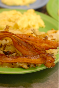 Apple wood smoked Bacon, House Fries, and scrambled eggs