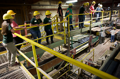 West Michigan instructor Avril Wiers and a group of about 15 others learned about the lumber industry.