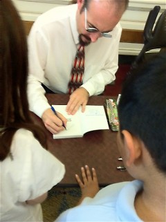 GAAH Press Club gets their books signed by Michigan author Johnathan Rand.