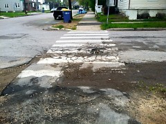 Even before harsh winter weather, Grand Rapids streets, such as Baldwin in East Hills, show substantial deterioration.