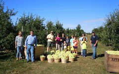 Volunteers and Feeding America West Michigan staff teamed up to gather nearly 600 pounds of apples at Riveridge.