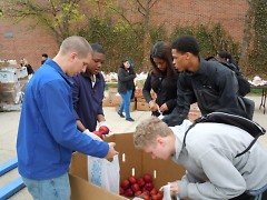 Students and local church members volunteer at Union High School's monthly Mobile Pantries.