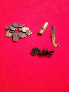 Spanish coins and gun parts are among the finds from the sunken ship The Whydah -- part of the GRPM exhibit Real Pirates.