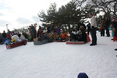 start of the WinterWest Crazy Cardboard Sled Race