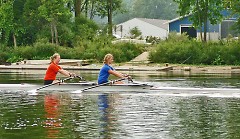 Grand Rapids Crew members train for fall regattas in a double rowing shell just off the shore of the GR Rowing Association
